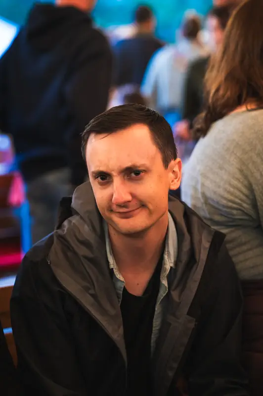 Portrait showing someone reacting after noticing the camera